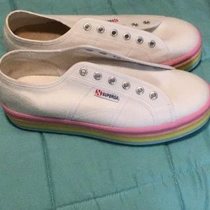 Never worn Superga tennis with laces added. Cute colored soles